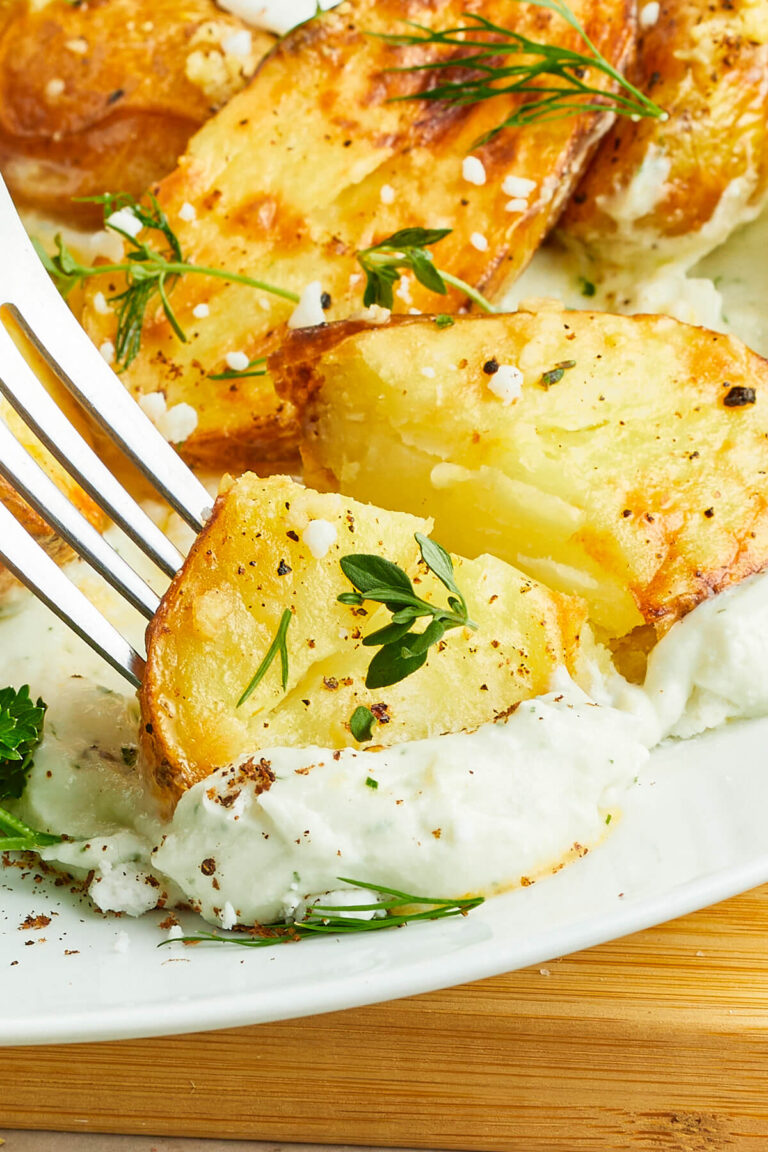 Lemon Roasted Potato being picked up with fork