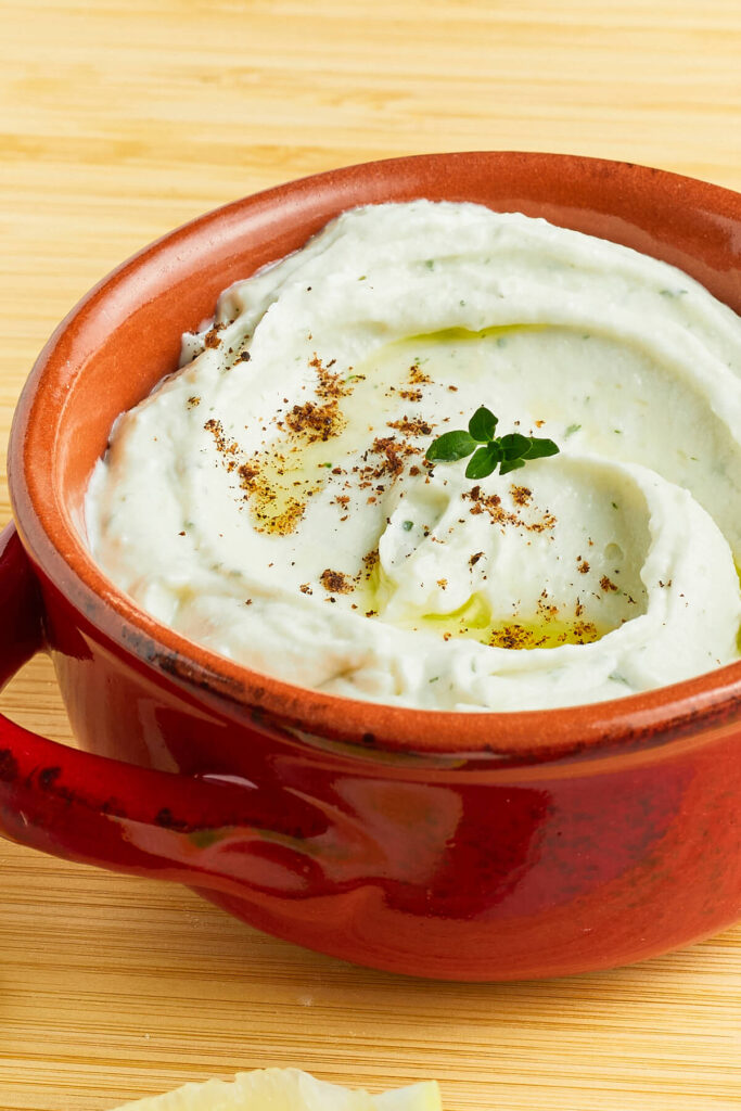 vegan feta sauce in serving dish