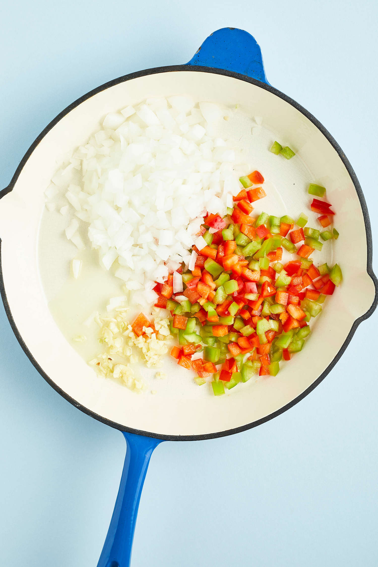 Peppers and onions in a skillet