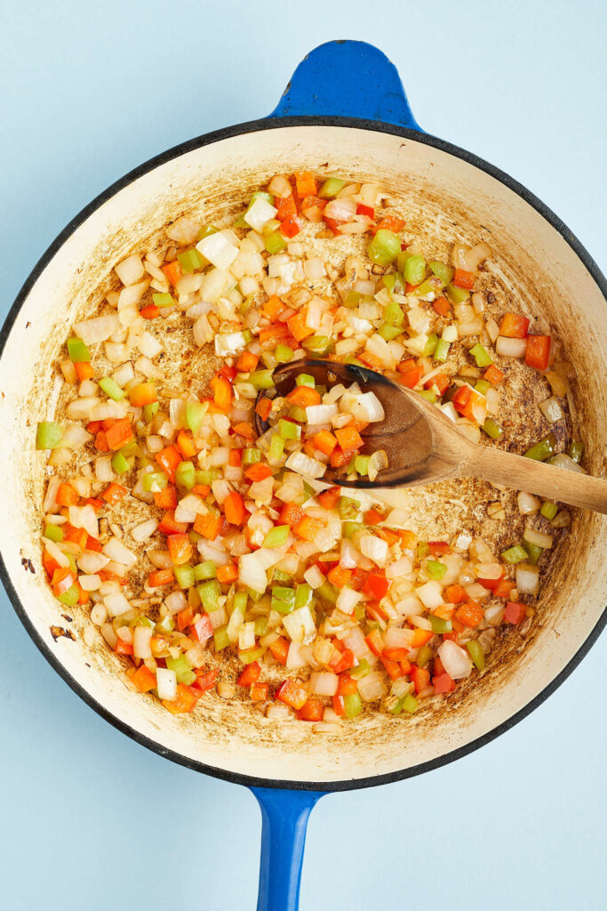 cooking peppers and onions in skillet