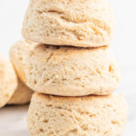 Three vegan biscuits stacked on marble background