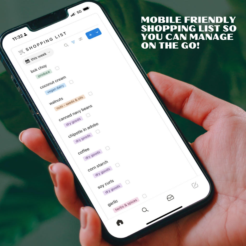a female hand holding an iphone with the notion meal planner template pulled up to the shopping list